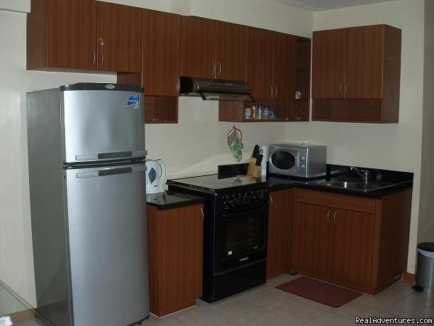 Fully-equipped kitchen | City Resort Residence right in Ortigas | Image #4/16 | 
