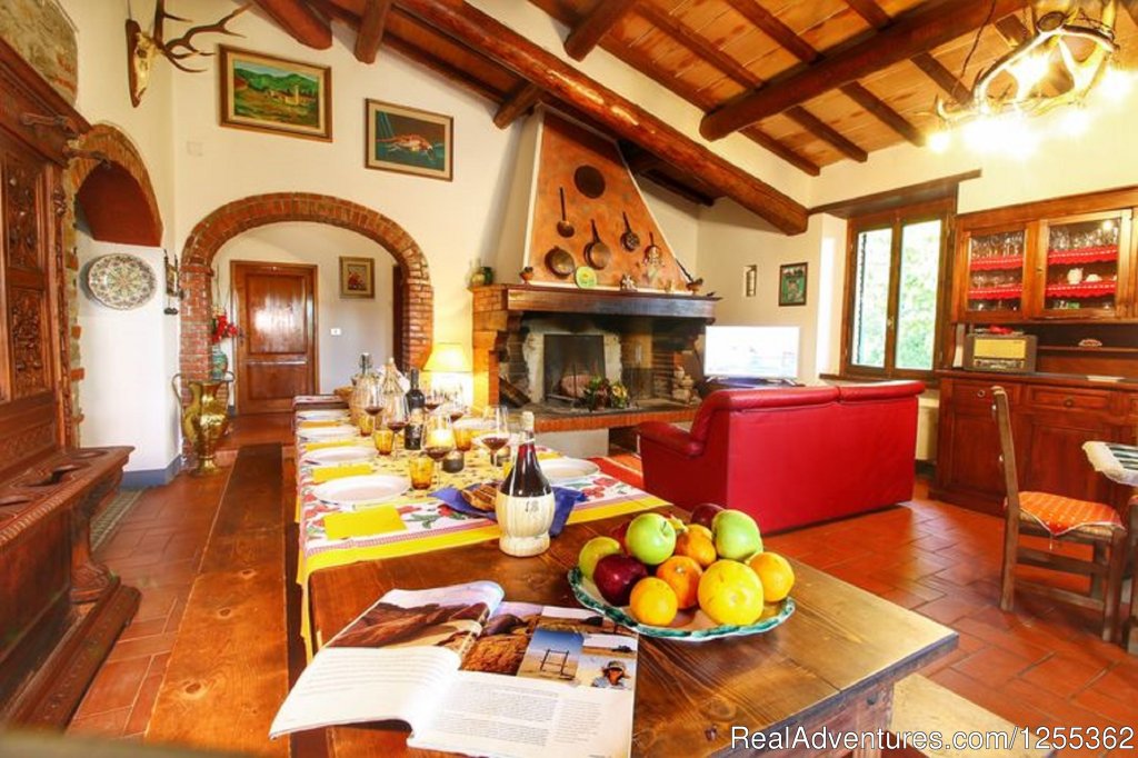 Dining room with fireplace | Hunting in Tuscany 'Riserva di Caccia Le Corniole' | Image #7/26 | 