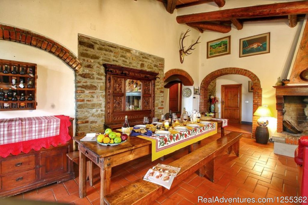 Dining room with fireplace | Hunting in Tuscany 'Riserva di Caccia Le Corniole' | Image #18/26 | 