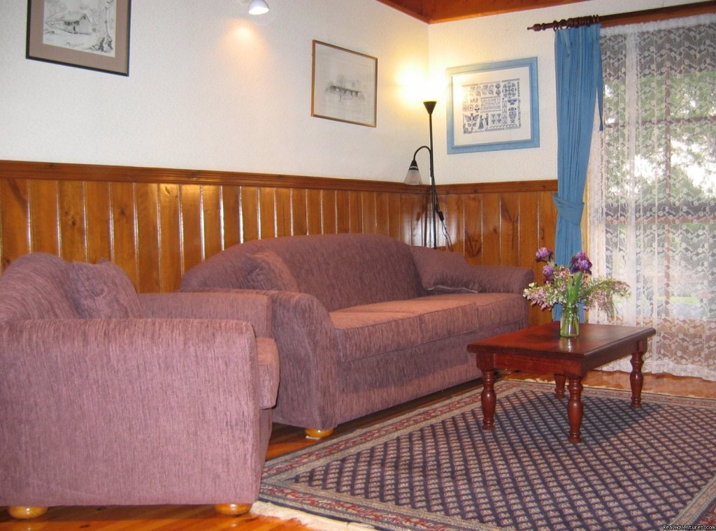 The comfortable apartment lounge | Romantic Buttercup Cottage & Private Apartment | Image #2/6 | 