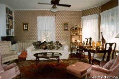 Livingroom/library seats 6 & has cable TV | Chestnut Inn | Image #8/9 | 