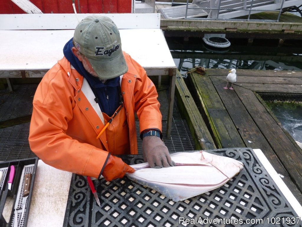 Stand clear - expert at work | Fantastic Deep-Sea Fishing in Alaska | Image #10/10 | 