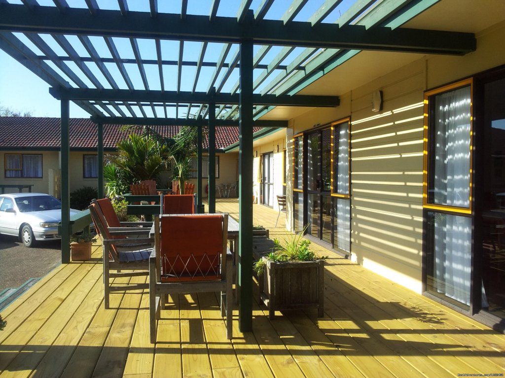 Sunny deck outside superior studios. | Aotearoa Lodge & Tours for relaxed homely ambience | Image #2/8 | 