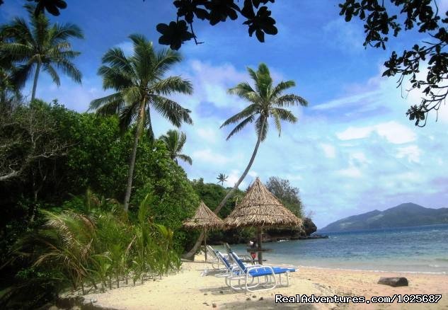 Sun shades on the beach at Tiliva Resort | Scuba Dive at Tiliva Resort in Kadavu Fiji | Kadavu, Fiji | Hotels & Resorts | Image #1/20 | 
