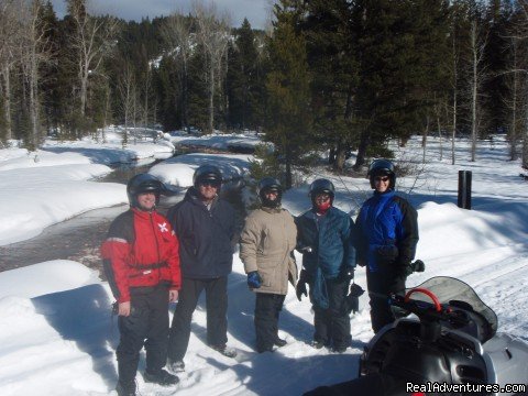 A pause along Dunham Creek | Rich Ranch Winter Snowmobiling Adventures | Image #8/15 | 