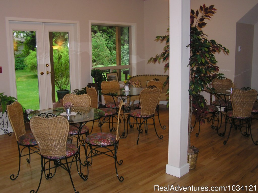 Enjoy our bistro garden-view dining room. | Cedar Wood Lodge Bed & Breakfast Inn | Image #9/26 | 