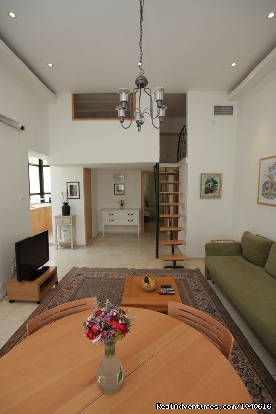 View of the bedroom and sleeping loft from the lounge | Stylish Vacation Apartments in Jerusalem | Image #6/14 | 
