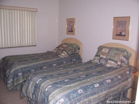 Two beds in 2nd Bedroom | Cocoa Beach OCEANFRONT Condo! | Image #6/18 | 