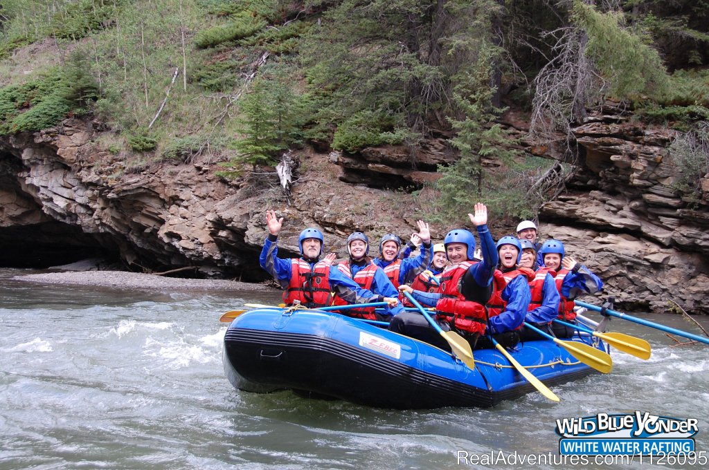 Waving to the camera on Sulphur River | Alberta's Best Rafting at Wild Blue Yonder | Image #8/11 | 