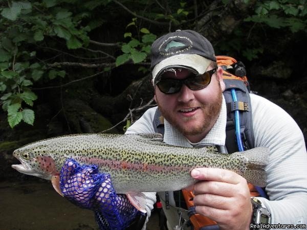 Client and a beautifull Rainbow trout | Remote Alaska fly fishing & Adventures lodge | Anchorage, Alaska  | Fishing Trips | Image #1/1 | 