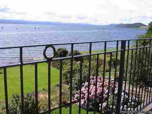 The garden & Moray Firth from the terrace outside the bedroo | 5 star Water's Edge Bed and Breakfast in Scotland | Image #3/8 | 