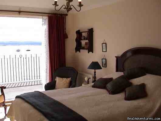 Bedroom 2 & French door to the terrace. | 5 star Water's Edge Bed and Breakfast in Scotland | Image #5/8 | 