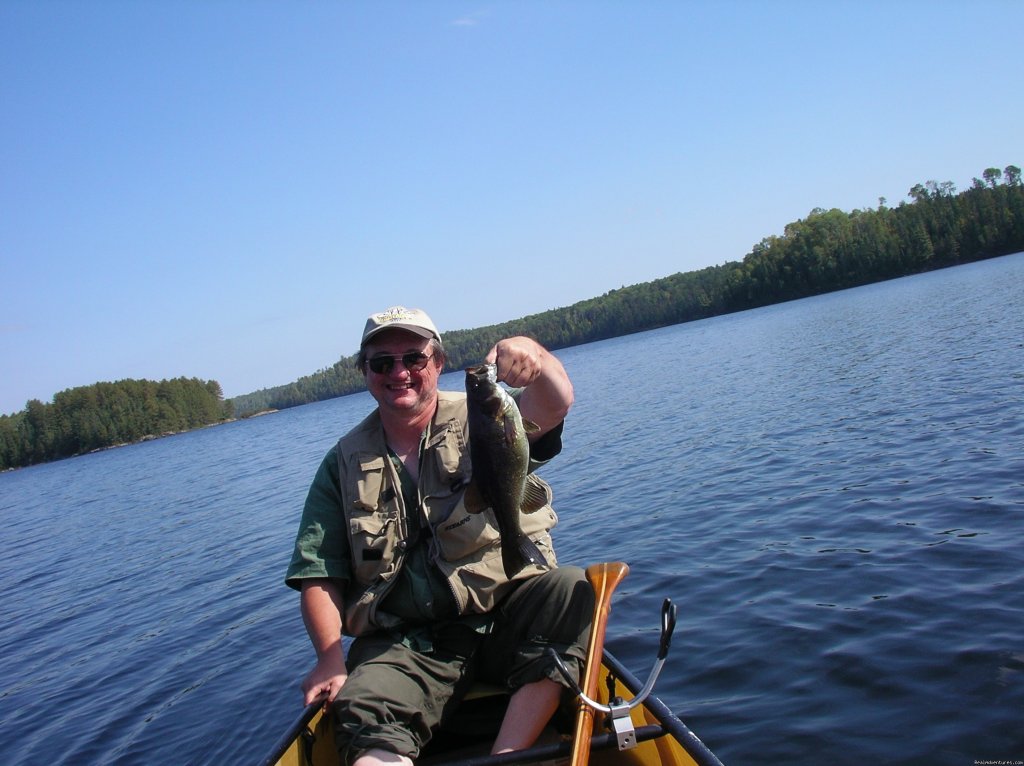 John & a nice fish | Ontario/Quetico Park canoe trip | Image #7/11 | 