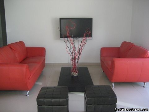 Living Room with 42 new plasma TV  | Ocean Villa 2 blocks from the beach in San Juan | Image #2/6 | 