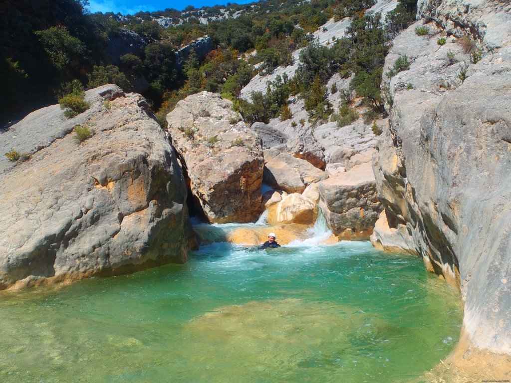 Natural swimming pool in the middle of a canyon | Canyoning And Adventure In Sierra De Guara - Spain | Image #5/6 | 