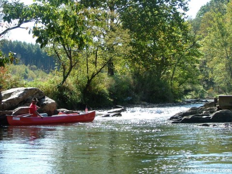 Canoeing, kayaking, and tubing in the mountains 