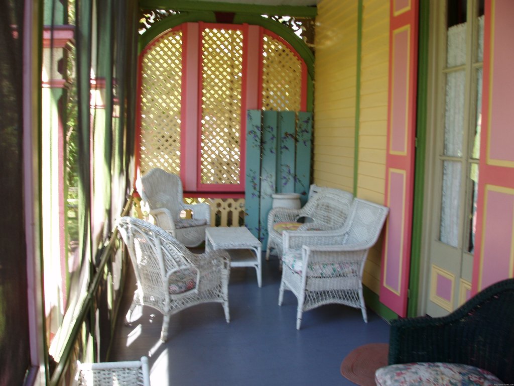 Half Of Private Side Porch | Rent a Victorian B&B, 2 blocks to the beach | Image #3/7 | 