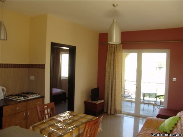 Villa Narmada Living room 1 BD apt | Selfcatering luxuous hotelrooms near the beach  | Image #3/10 | 