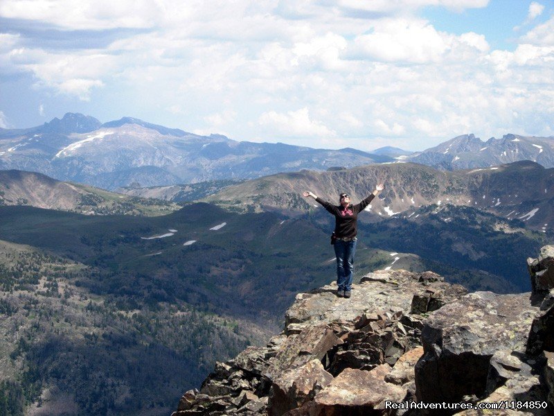 Hiker on the top of Monument Peak | Hawley Mountain Guest Ranch Vacation | Image #4/16 | 