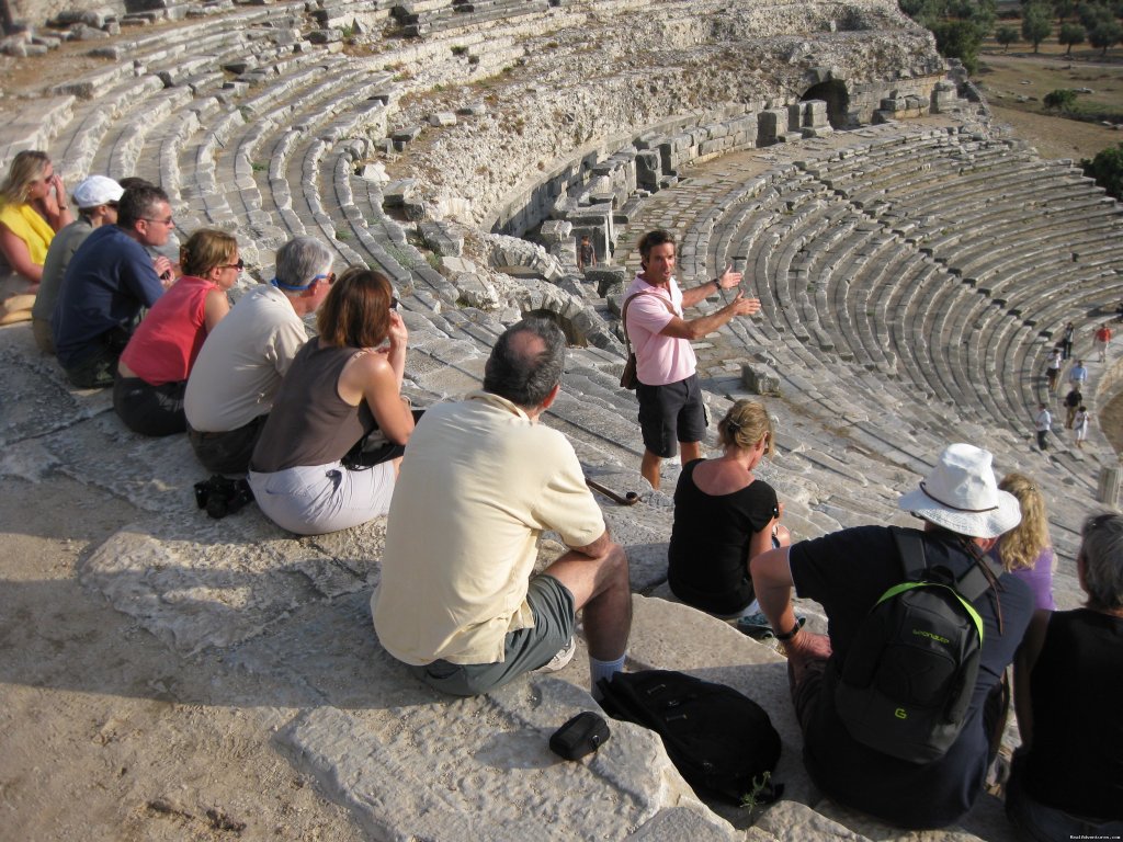 Tour guide and group in theatre, Turkey | Archaeological Tours, Gulet Cruises and Charters | Image #22/23 | 