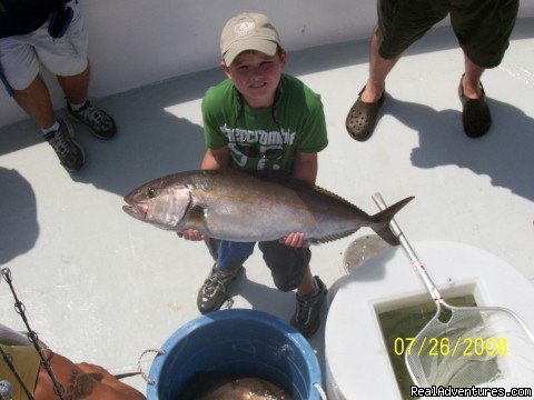 Young man with a big'n | Gulf Shores-Orange Beach FISHING | Image #2/4 | 