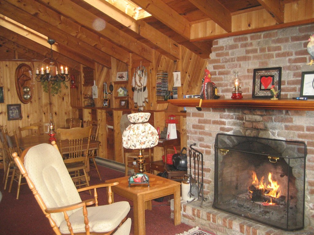 Inside cottage with wood burning fireplace | Morning Mist Sanctuary & Spa | Image #9/17 | 