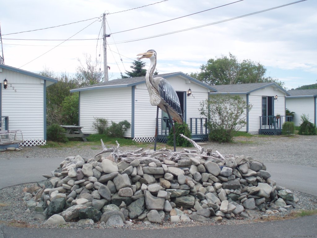 Heron with Chalets in background | Cove Motel & Mariner Dining Room | Image #3/15 | 