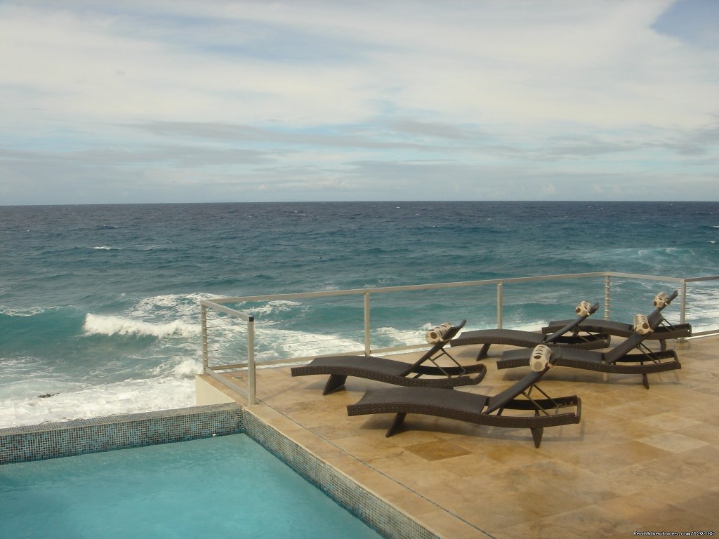 Relax on a lounge and read or dip in the pool | SeaViewPlay  New Pool & Fabulous Ocean Front Villa | Image #8/26 | 