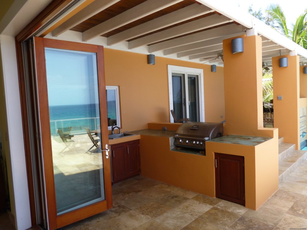 The outdoor kitchen with reflection of the deck | SeaViewPlay  New Pool & Fabulous Ocean Front Villa | Image #15/26 | 