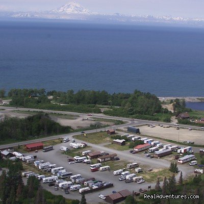 Aerial view of the RV park and Cook Inlet | Alaskan Angler RV Resort, Cabins & Charters | Ninilchik, Alaska  | Campgrounds & RV Parks | Image #1/6 | 