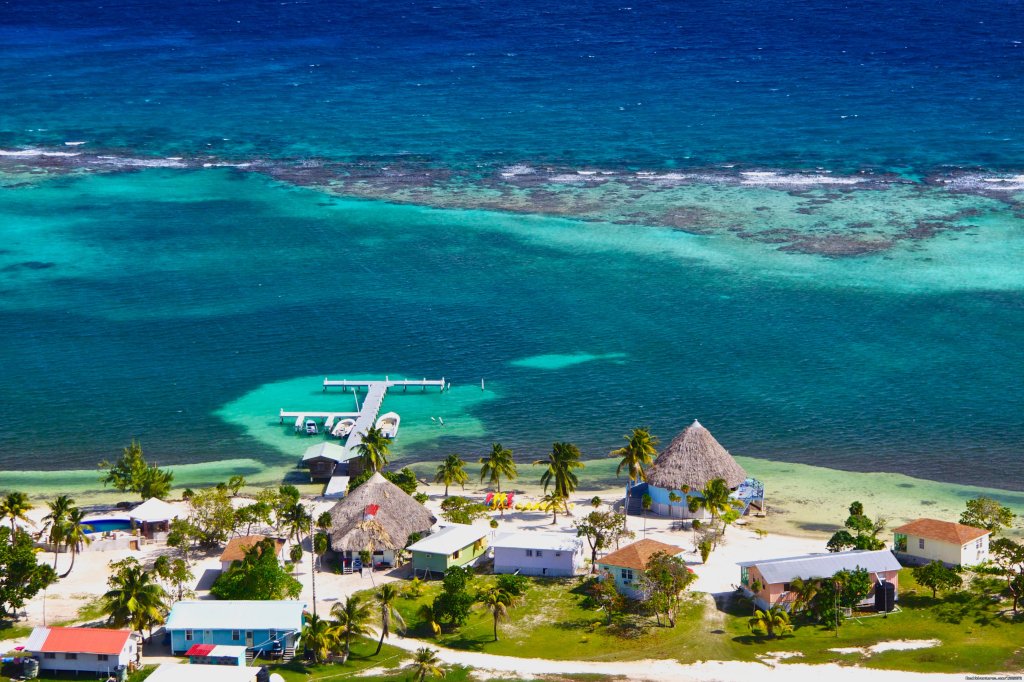 Bird's eye view of the resort and reefs | World Class Diving & Snorkeling on private island | Adjohoun, Belize | Hotels & Resorts | Image #1/6 | 