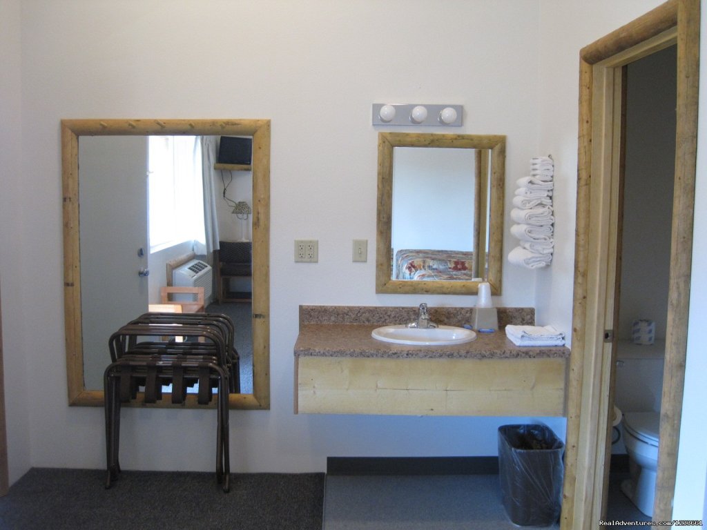 Vanity area out side of full tub shower area  | Big Bear Motel | Image #2/6 | 