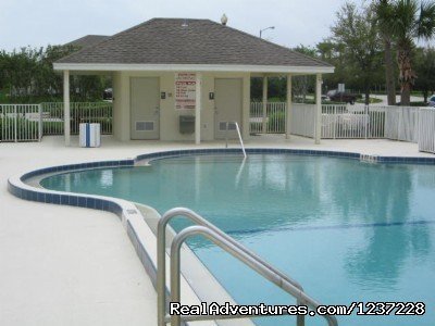 Community Pool | Jungle Retreat, pool home near Disney, wifi & more | Image #16/17 | 