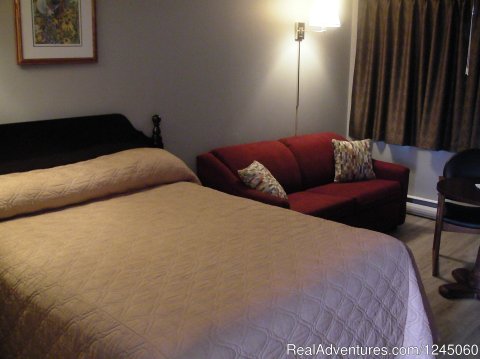 Single room with queen bed.