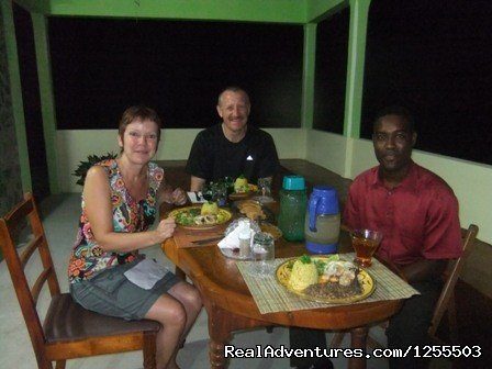 Guest having dinner with Owner | Affordable vacation in Dominica | Image #6/12 | 