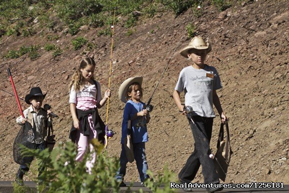Kid's on the way to the pond to catch some fish | Colorado Trails Ranch, Colorado's Friendliest | Image #9/13 | 