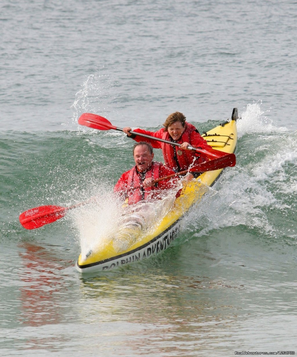 Riding the surf | Dolphin Adventures Sea Kayaking | Image #4/8 | 