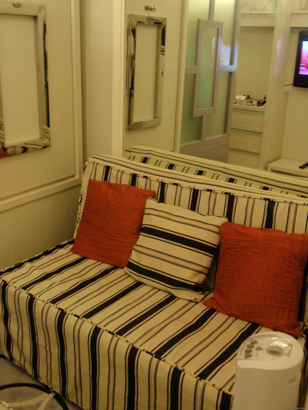 Living Area And Love Seat | Fully Furnished Studio-condo Unit In Manila | Image #22/26 | 