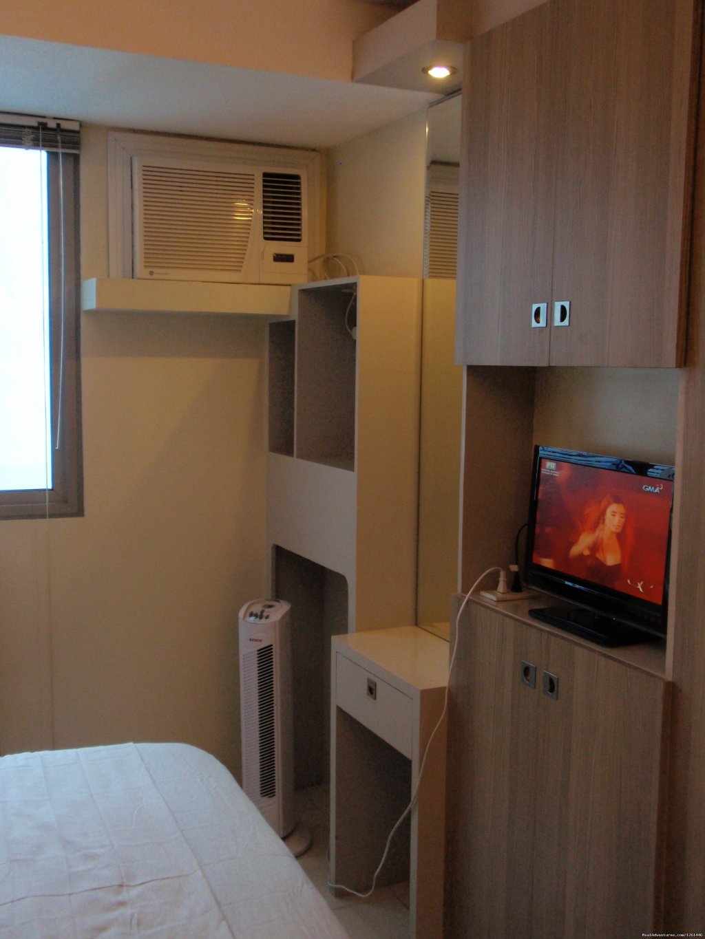 25th floor unit TV, vanity area. | Fully Furnished Studio-condo Unit In Manila | Image #17/26 | 