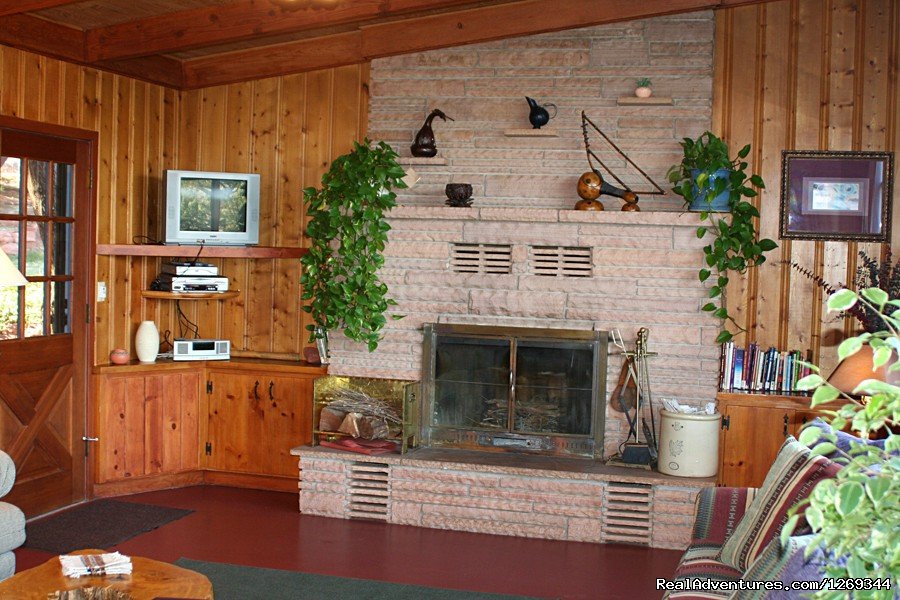 Homestead House Living Room cozy fireplace | Cathedral Rock Lodge & Retreat Center | Image #8/16 | 