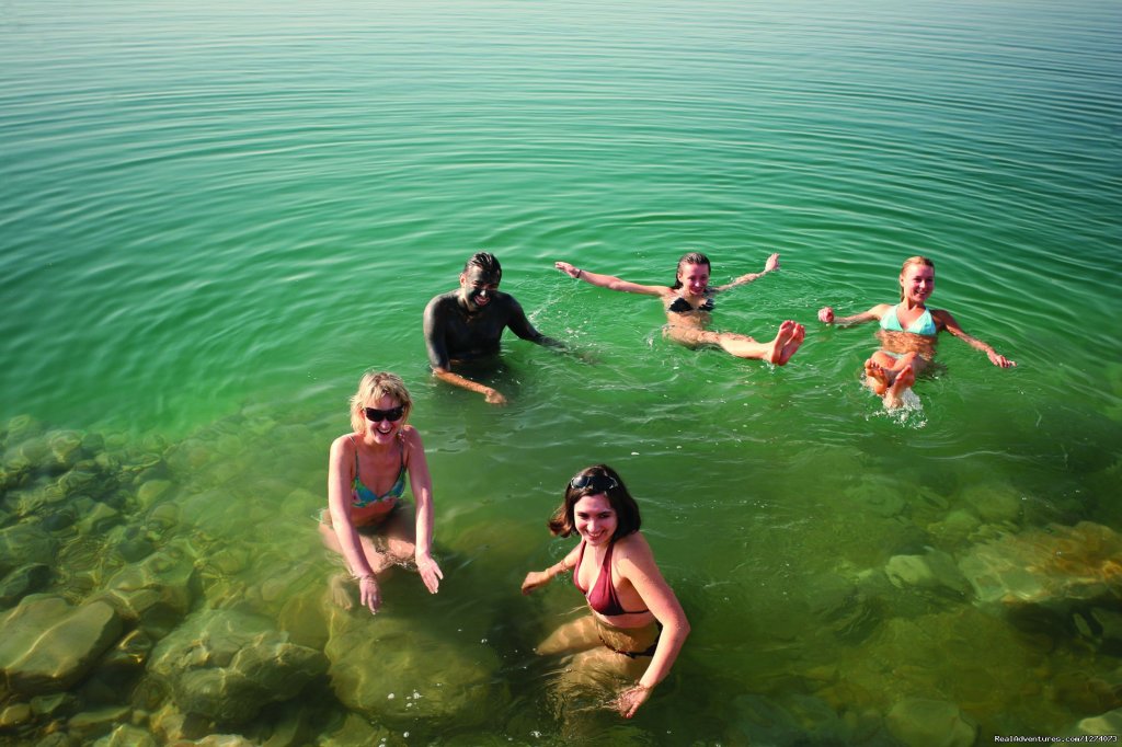 Floating in Dead Sea Jordan | Jordan Discovery Tours: 3 Nights - 4 Days Tour | Amman, Jordan | Sight-Seeing Tours | Image #1/3 | 