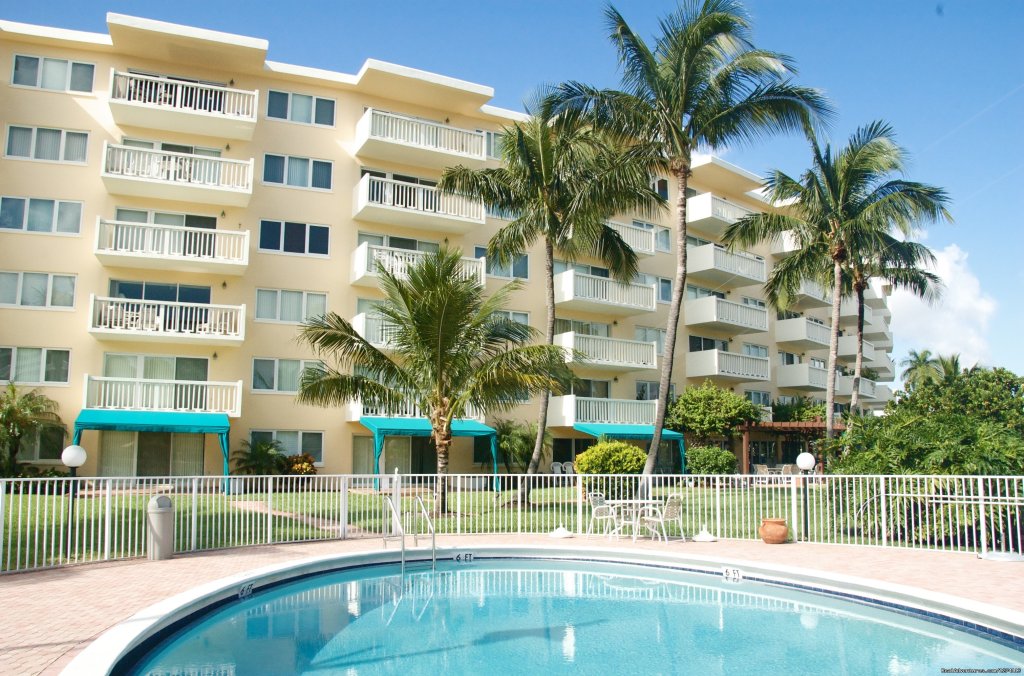 Heated pool in backyard | Yacht and Beach Club - Waterfront Condo | Image #12/25 | 