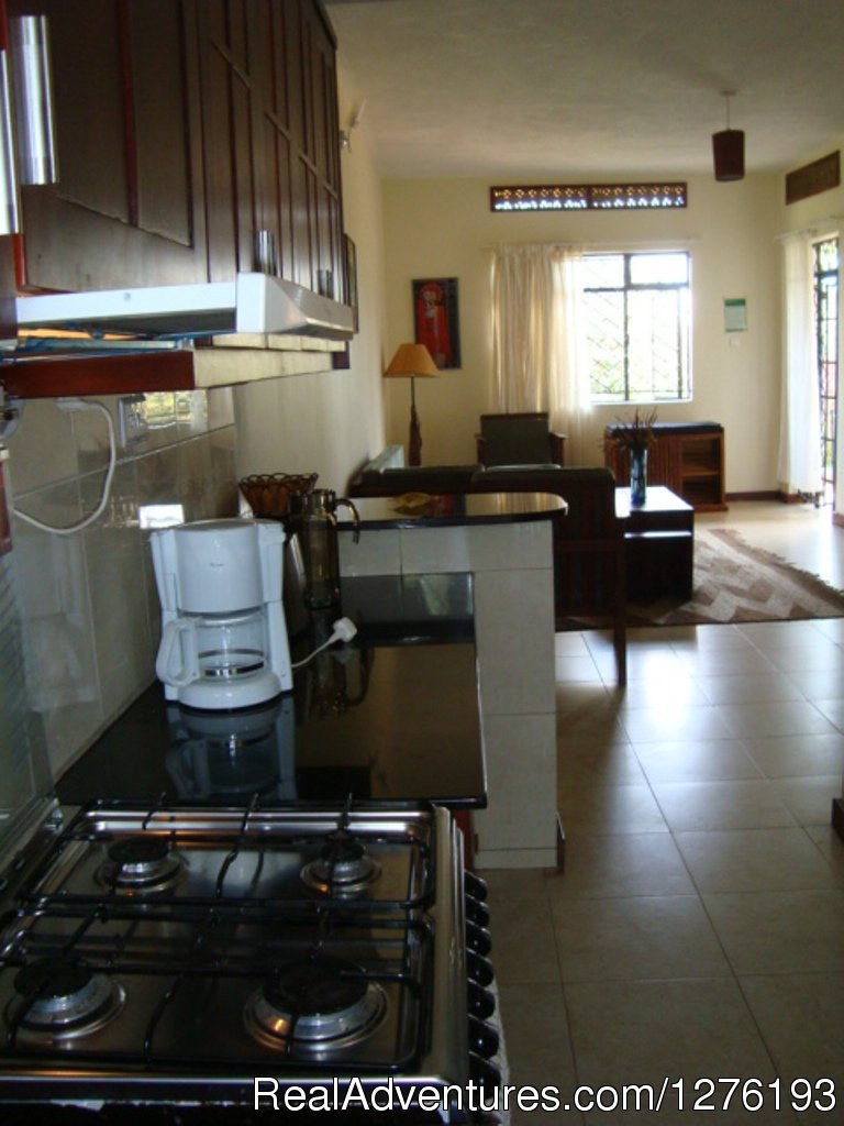 Side view of open plan kitchen | Vacation Rentals Short And Long Stays | Image #16/25 | 