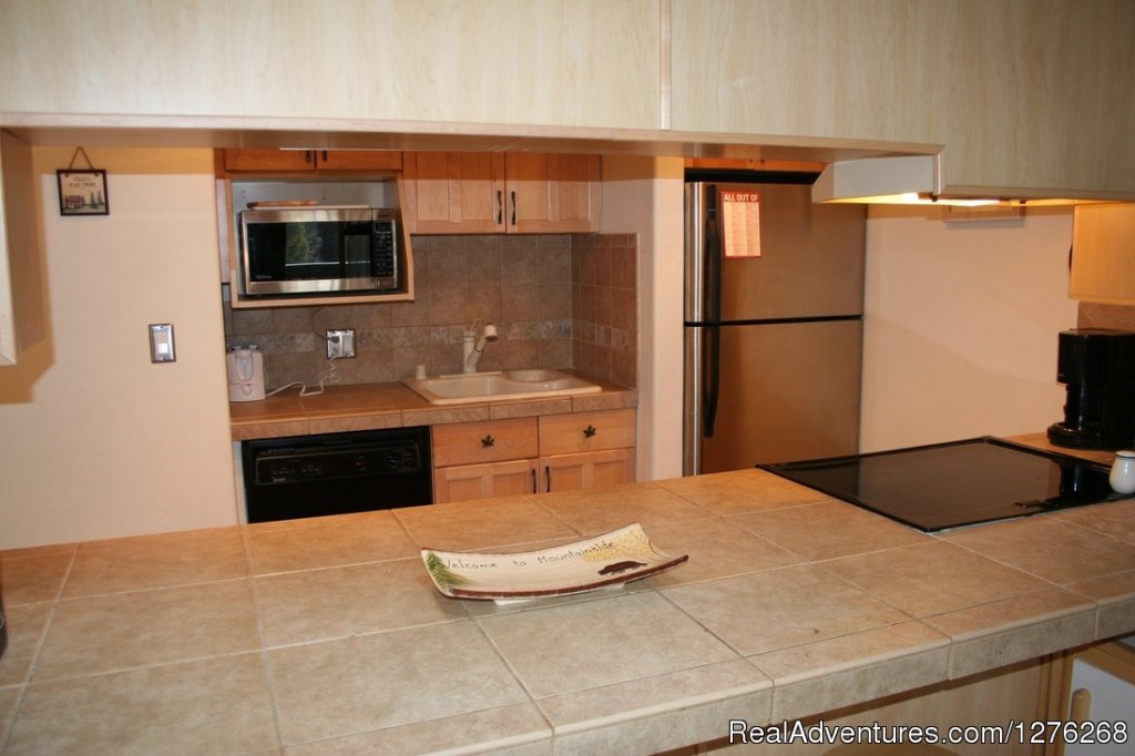 Kitchen (open To Living Room) | Updated condo in Summit County - Colorado Rockies | Image #2/12 | 