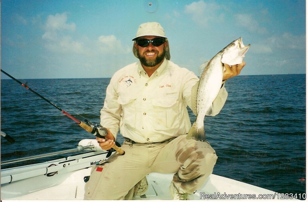 Captain Clay Showing Off A Nice Specklei Trout | Bayou Log Cabins | Image #6/13 | 