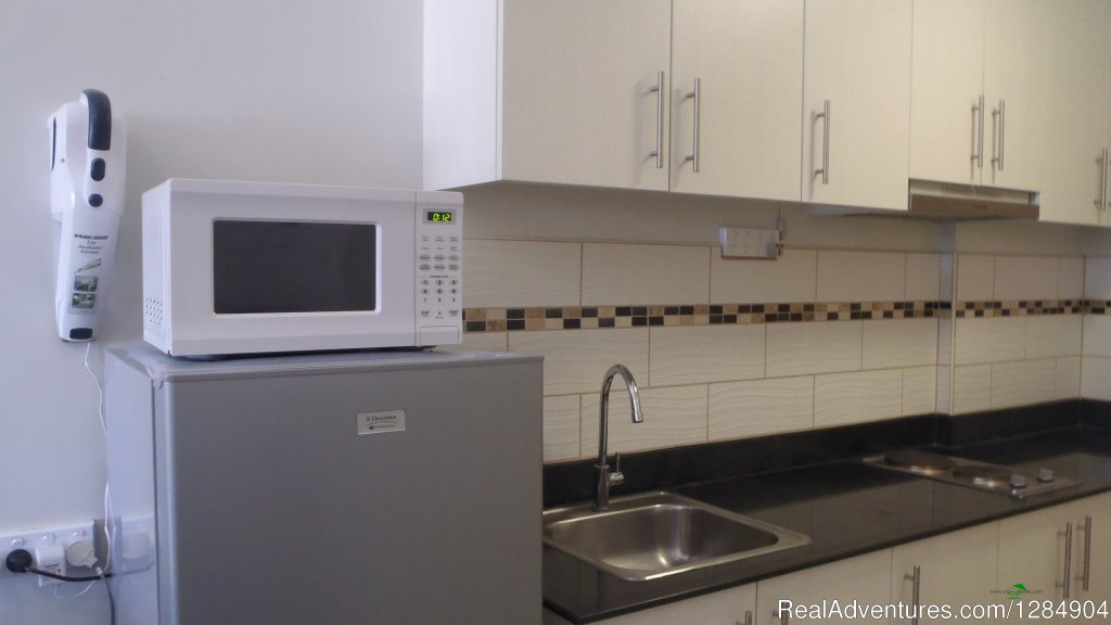Fully equipped kitchen | Manila Holiday Rentals at Sea Residences | Image #7/12 | 