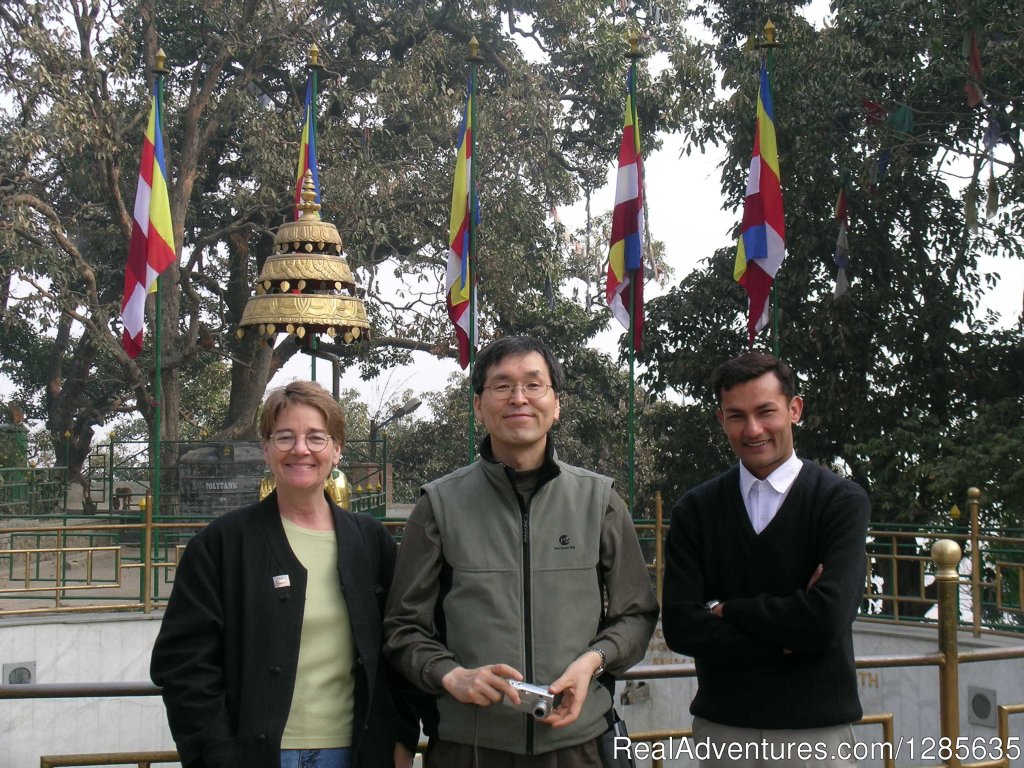 in front of Peace pond while guiding | Kathmandu Day Tour | Image #3/7 | 