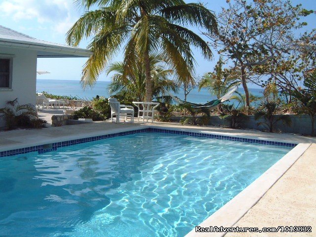 Swimming Pool | Heron Hill House Gorgeous Beachfront Villa | Image #3/22 | 