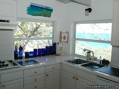 Section of main kitchen | Heron Hill House Gorgeous Beachfront Villa | Image #19/22 | 