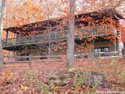 Pondview exterior during Fall Peak leaves falling | Smoky Mountain Log Cabin Vacation Rentals | Image #7/12 | 